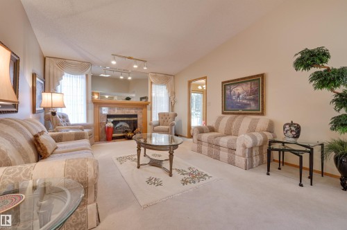 752 Wilkin Close, Edmonton, AB - Indoor Photo Showing Living Room With Fireplace