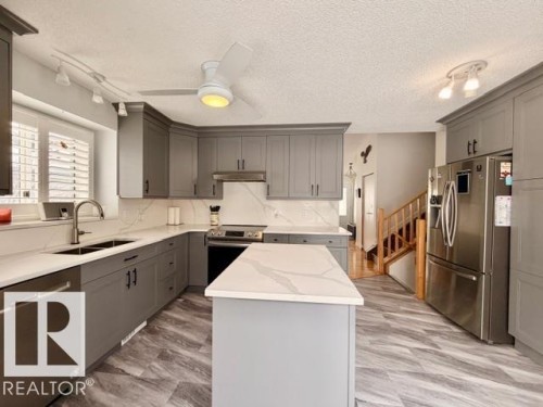 5607 54 Street, Beaumont, AB - Indoor Photo Showing Kitchen With Stainless Steel Kitchen With Double Sink