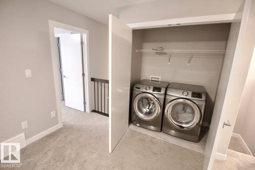 Upper 9385 Cooper Bend, Edmonton, AB - Indoor Photo Showing Laundry Room