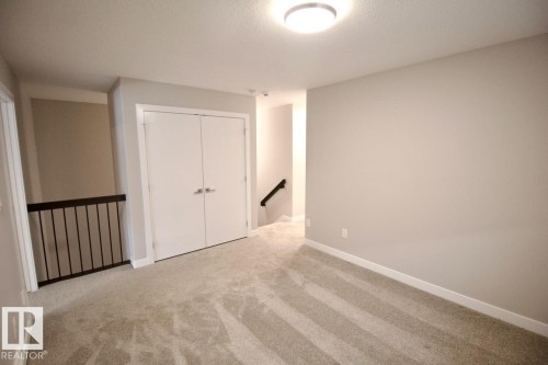 Upper 9385 Cooper Bend, Edmonton, AB - Indoor Photo Showing Other Room