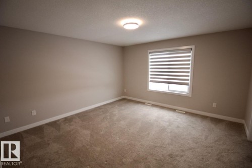Upper 9385 Cooper Bend, Edmonton, AB - Indoor Photo Showing Other Room