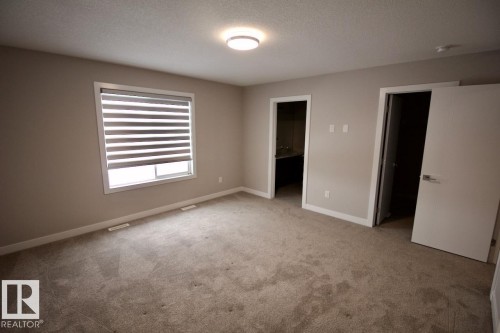 Upper 9385 Cooper Bend, Edmonton, AB - Indoor Photo Showing Other Room