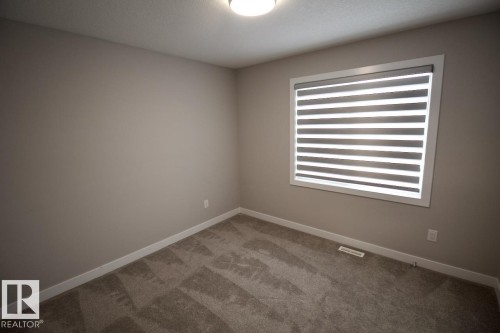 Upper 9385 Cooper Bend, Edmonton, AB - Indoor Photo Showing Other Room