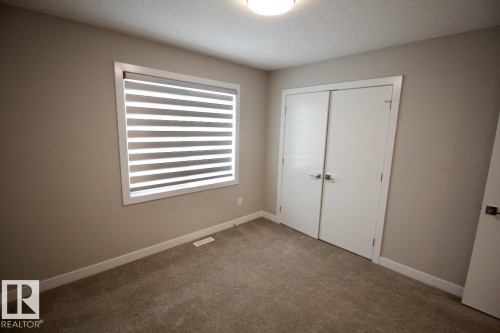 Upper 9385 Cooper Bend, Edmonton, AB - Indoor Photo Showing Other Room