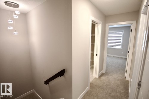 Upper 9385 Cooper Bend, Edmonton, AB - Indoor Photo Showing Other Room