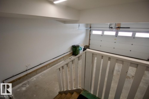Upper 9385 Cooper Bend, Edmonton, AB - Indoor Photo Showing Garage