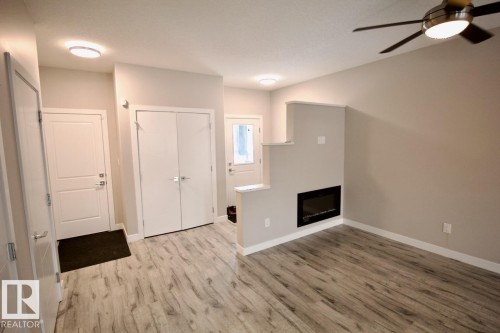 Upper 9385 Cooper Bend, Edmonton, AB - Indoor With Fireplace