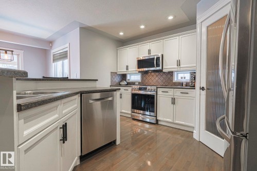 44 Normandeau Crescent, St. Albert, AB - Indoor Photo Showing Kitchen With Stainless Steel Kitchen With Double Sink