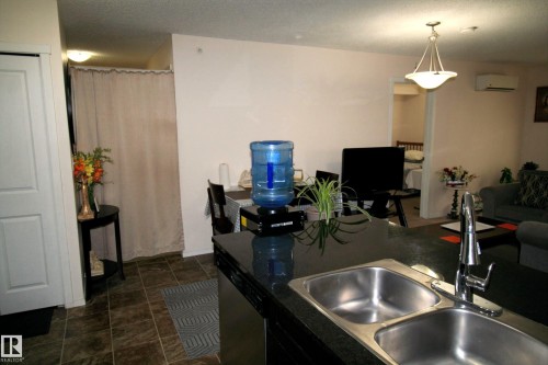 419 5816 Mullen Place, Edmonton, AB - Indoor Photo Showing Kitchen With Double Sink