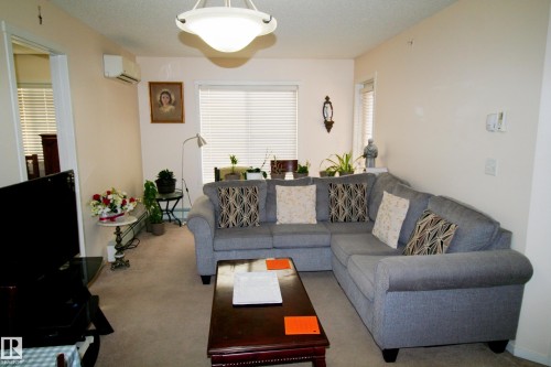419 5816 Mullen Place, Edmonton, AB - Indoor Photo Showing Living Room