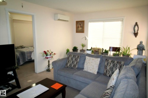 419 5816 Mullen Place, Edmonton, AB - Indoor Photo Showing Living Room