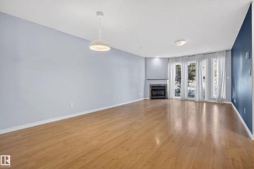 101 12110 106 Avenue, Edmonton, AB - Indoor With Fireplace