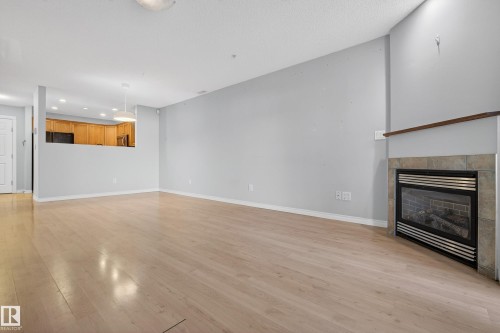 101 12110 106 Avenue, Edmonton, AB - Indoor With Fireplace