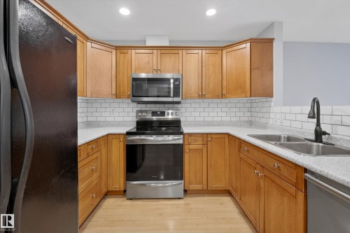 101 12110 106 Avenue, Edmonton, AB - Indoor Photo Showing Kitchen With Double Sink