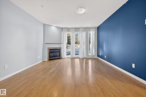 101 12110 106 Avenue, Edmonton, AB - Indoor With Fireplace