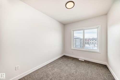44 18120 28 Avenue, Edmonton, AB - Indoor Photo Showing Other Room
