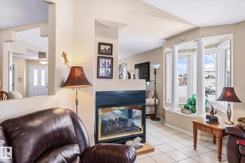 7020 157 Avenue, Edmonton, AB - Indoor Photo Showing Living Room With Fireplace