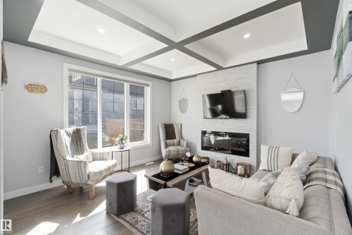5732 Keeping Crescent, Edmonton, AB - Indoor Photo Showing Living Room With Fireplace
