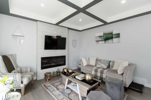 5732 Keeping Crescent, Edmonton, AB - Indoor Photo Showing Living Room With Fireplace