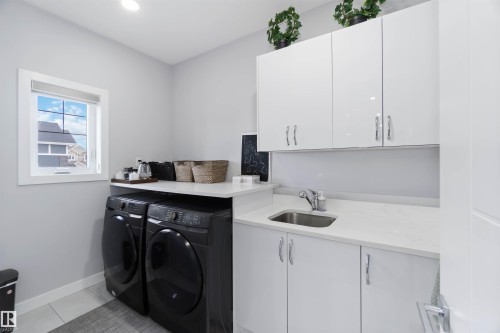 5732 Keeping Crescent, Edmonton, AB - Indoor Photo Showing Laundry Room
