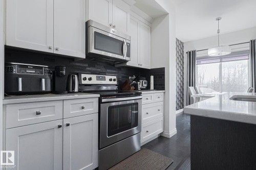720 Charlesworth Way, Edmonton, AB - Indoor Photo Showing Kitchen With Upgraded Kitchen