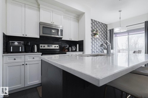 720 Charlesworth Way, Edmonton, AB - Indoor Photo Showing Kitchen With Upgraded Kitchen