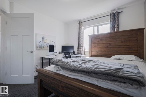 720 Charlesworth Way, Edmonton, AB - Indoor Photo Showing Bedroom
