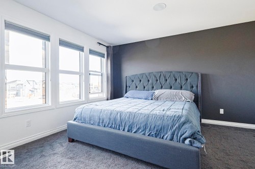 720 Charlesworth Way, Edmonton, AB - Indoor Photo Showing Bedroom