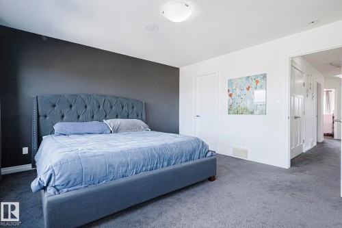 720 Charlesworth Way, Edmonton, AB - Indoor Photo Showing Bedroom
