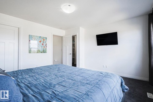 720 Charlesworth Way, Edmonton, AB - Indoor Photo Showing Bedroom