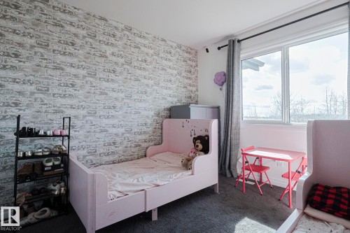 720 Charlesworth Way, Edmonton, AB - Indoor Photo Showing Bedroom