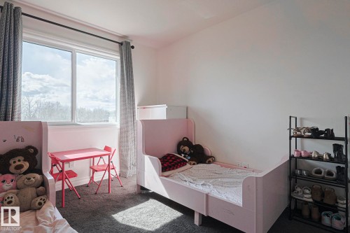 720 Charlesworth Way, Edmonton, AB - Indoor Photo Showing Bedroom