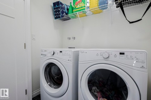 720 Charlesworth Way, Edmonton, AB - Indoor Photo Showing Laundry Room