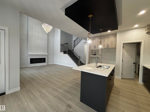 2137 209A Street Nw, Edmonton, AB - Indoor Photo Showing Kitchen With Fireplace