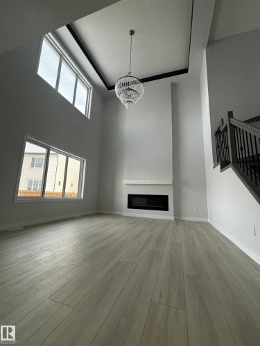 2137 209A Street Nw, Edmonton, AB - Indoor Photo Showing Other Room With Fireplace