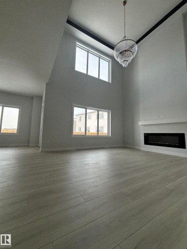 2137 209A Street Nw, Edmonton, AB - Indoor Photo Showing Other Room With Fireplace