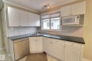 4417 44 Street, Stony Plain, AB  - Indoor Photo Showing Kitchen With Double Sink 