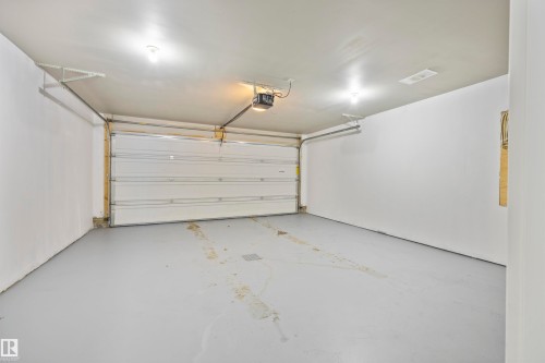 56 655 Watt Boulevard, Edmonton, AB - Indoor Photo Showing Garage