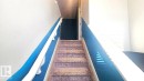 View of staircase - 4610 Kinsella Landing Sw, Edmonton, AB  - Indoor Photo Showing Other Room 