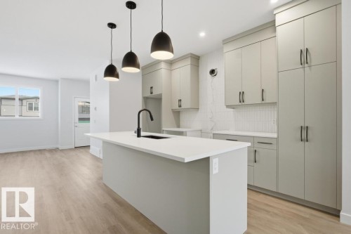 9115 Elves Loop, Edmonton, AB - Indoor Photo Showing Kitchen With Upgraded Kitchen