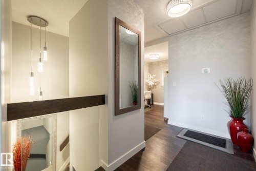 122 5151 Windermere Boulevard, Edmonton, AB - Indoor Photo Showing Other Room