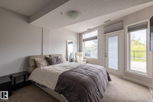122 5151 Windermere Boulevard, Edmonton, AB - Indoor Photo Showing Bedroom