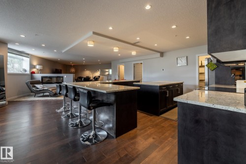 122 5151 Windermere Boulevard, Edmonton, AB - Indoor Photo Showing Kitchen With Upgraded Kitchen