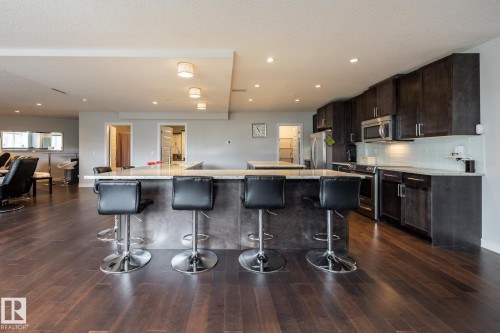 122 5151 Windermere Boulevard, Edmonton, AB - Indoor Photo Showing Kitchen With Upgraded Kitchen