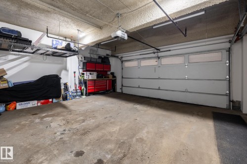 122 5151 Windermere Boulevard, Edmonton, AB - Indoor Photo Showing Garage