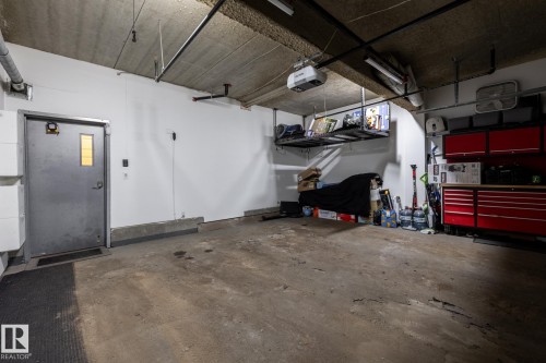 122 5151 Windermere Boulevard, Edmonton, AB - Indoor Photo Showing Garage