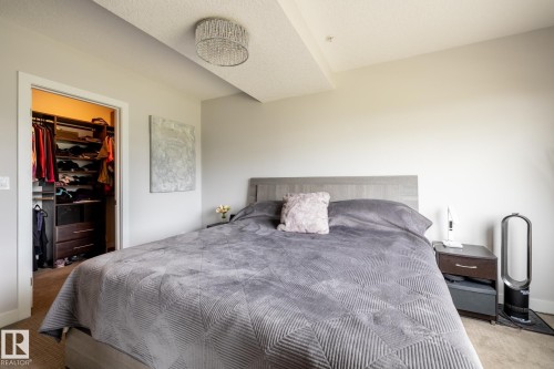 122 5151 Windermere Boulevard, Edmonton, AB - Indoor Photo Showing Bedroom