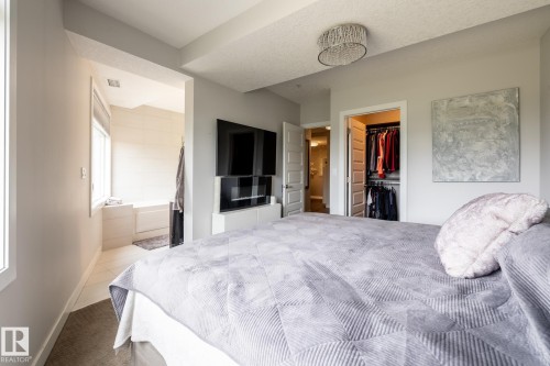 122 5151 Windermere Boulevard, Edmonton, AB - Indoor Photo Showing Bedroom
