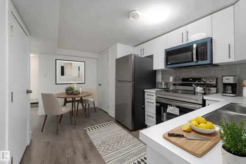 10519 40 Street, Edmonton, AB - Indoor Photo Showing Kitchen With Double Sink