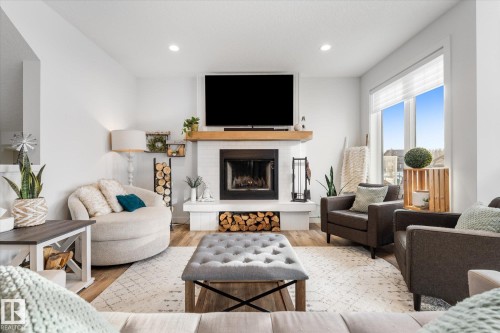 18 3410 Ste. Anne Trail, Rural Lac Ste. Anne County, AB - Indoor Photo Showing Living Room With Fireplace